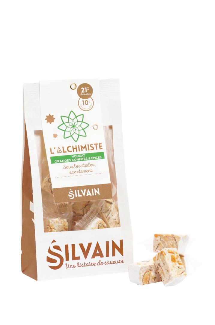 L’Alchimiste Nougat blanc aux épices et oranges confites Sachet 125 g
